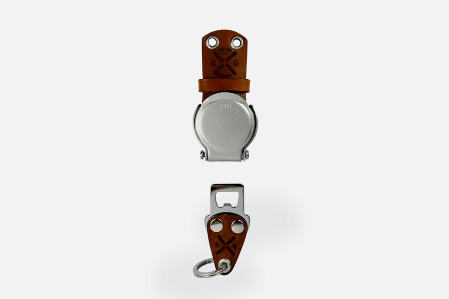 SCHLÜSSELHALTER/RUND (WAND) - COGNAC/SILBER